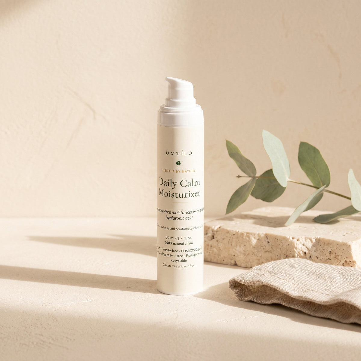 Daily Calm Moisturizer styled with eucalyptus