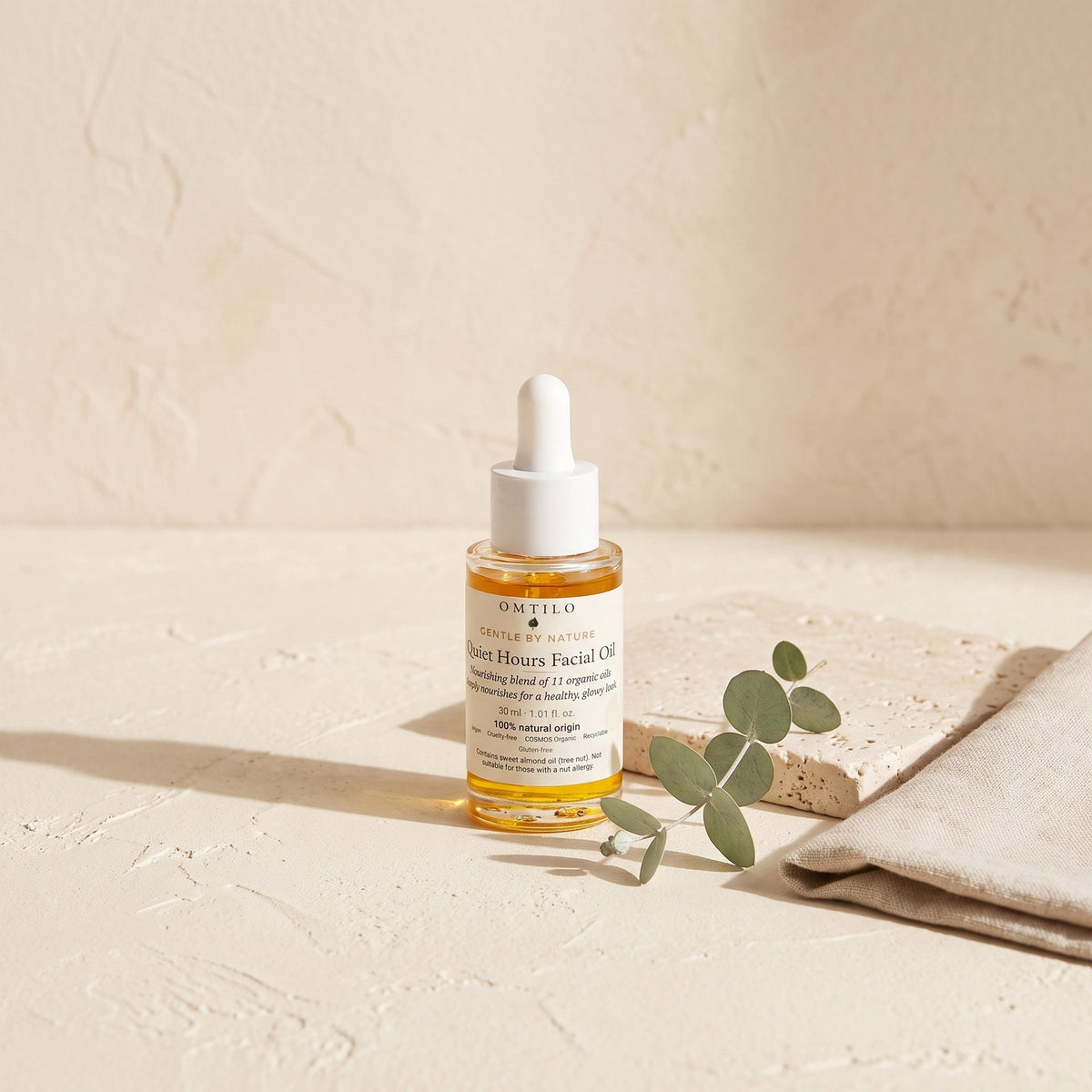 Quiet Hours Facial Oil in hand on vanity